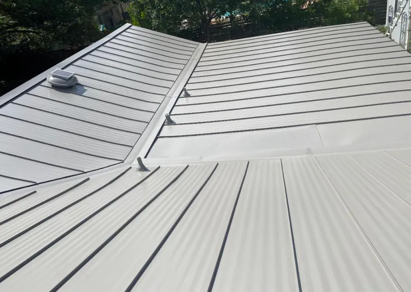 Solar attic fan installed on a metal roof for Roof Ventilation in Healdsburg